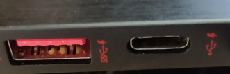 El símbolo de la Batería o el Rayo en el usb